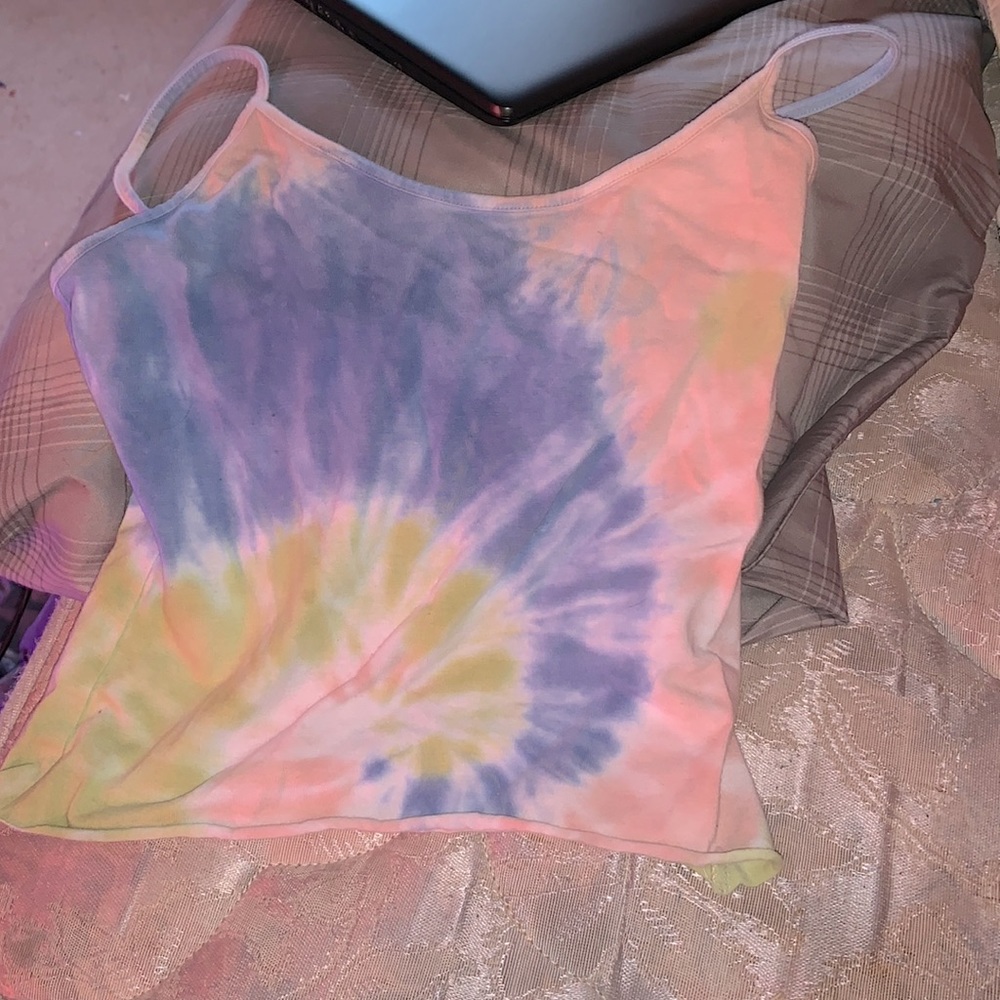 A Tank top it shows belly and it’s tie dye
